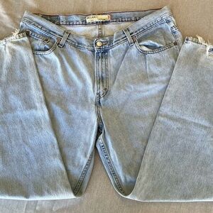 Distressed Light Blue Denim Levi’s 550’s size 20m.